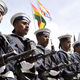 Bolivian navy troops parade during a ceremony commemorating the 134th anniversary of the invasion by Chilean troops to the then-Bolivian port of Antofagasta that triggered the Pacific War.